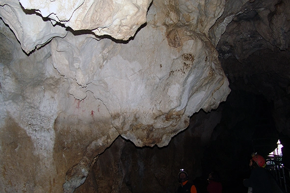 Speleologists surveying the red paintings of Grotta dell'Arco di Bellegra in 2007